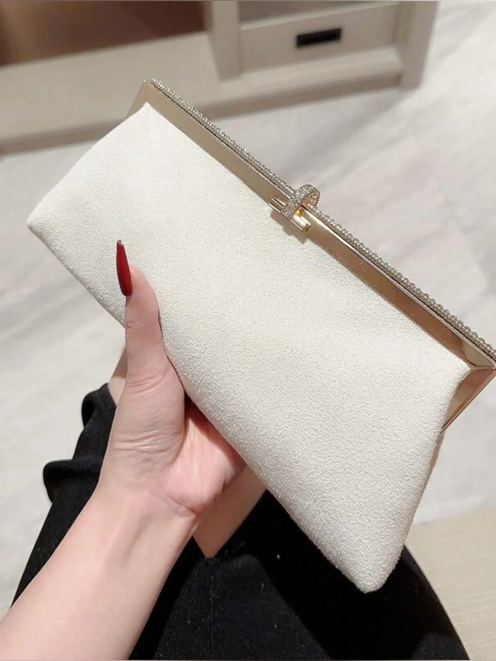 Elegant Cream Evening Clutch with Gold Accents